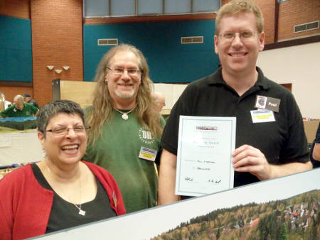 Paul Steedman with GRS Chair Angie Myers-Upphoff and Globalrail organiser Alan Monk